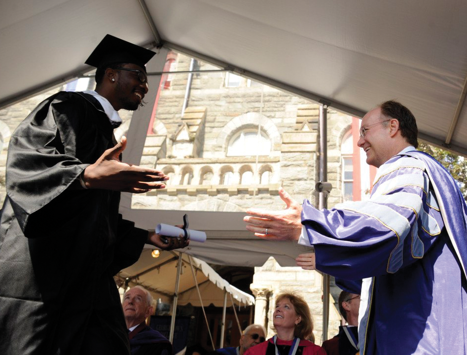 	GUHOYAS
Green (COL ’12) received his degree in English with a minor in theology from Georgetown University President John J. DeGioia.