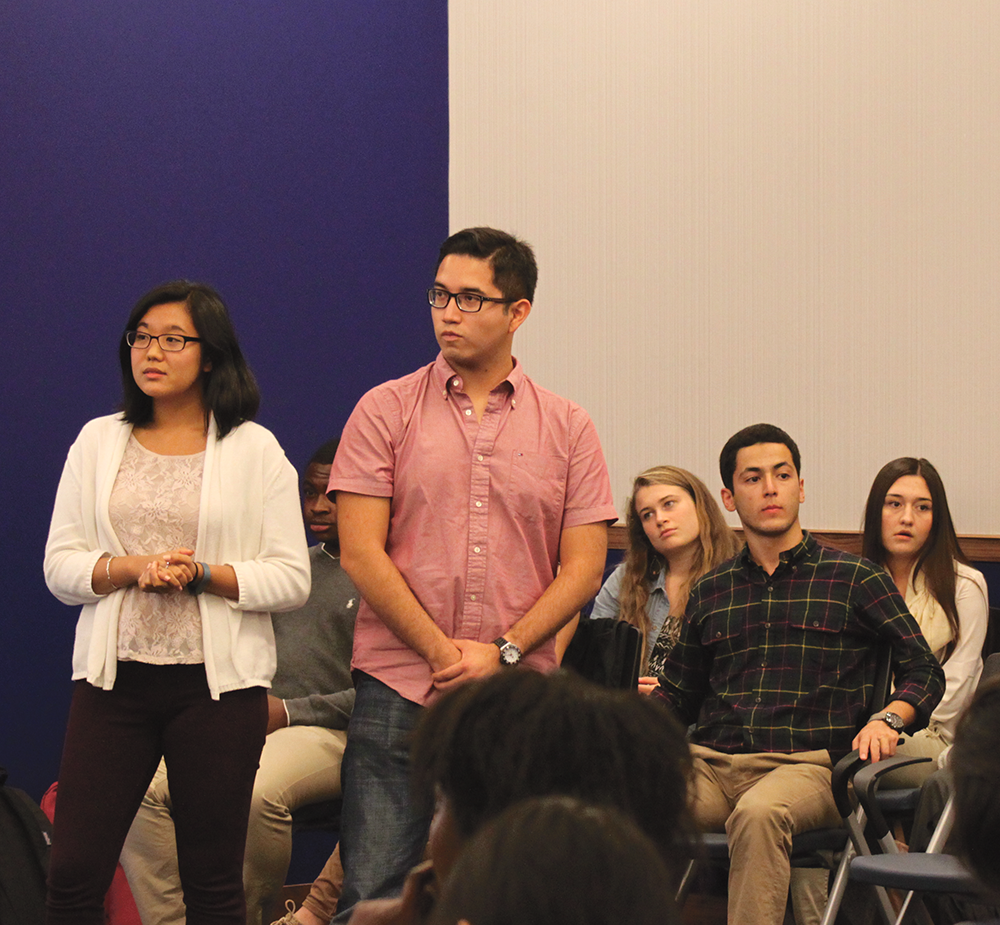 CHARLIE LOWE/THE HOYA
GUSA Director of Outreach Eng Gin Moe (SFS ’16) and Deputy Director of Outreach Rodrigo Gonzalez (SFS ’15) lead the Multicultural Council’s first town hall, which aimed to solicit feedback on the council’s agenda.