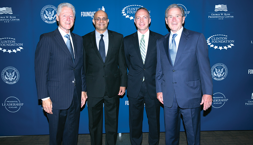 COURTESY PAUL ALMEIDA
From left: former President Bill Clinton (SFS ’68), professors Paul Almeida and Michael O’Leary and former President George W. Bush. The MSB professors will participate in the Presidential Leadership Program.
