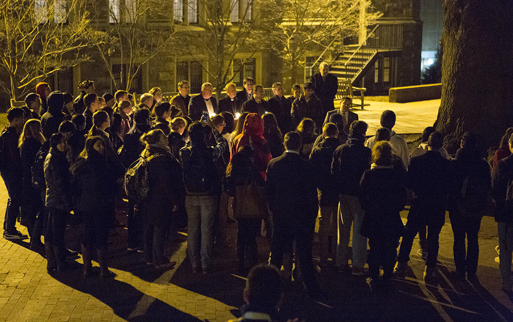ALEXANDER BROWN/THE HOYA
Around 100 students joined to mourn the deaths of three Muslim students in a shooting at UNC Chapel Hill.