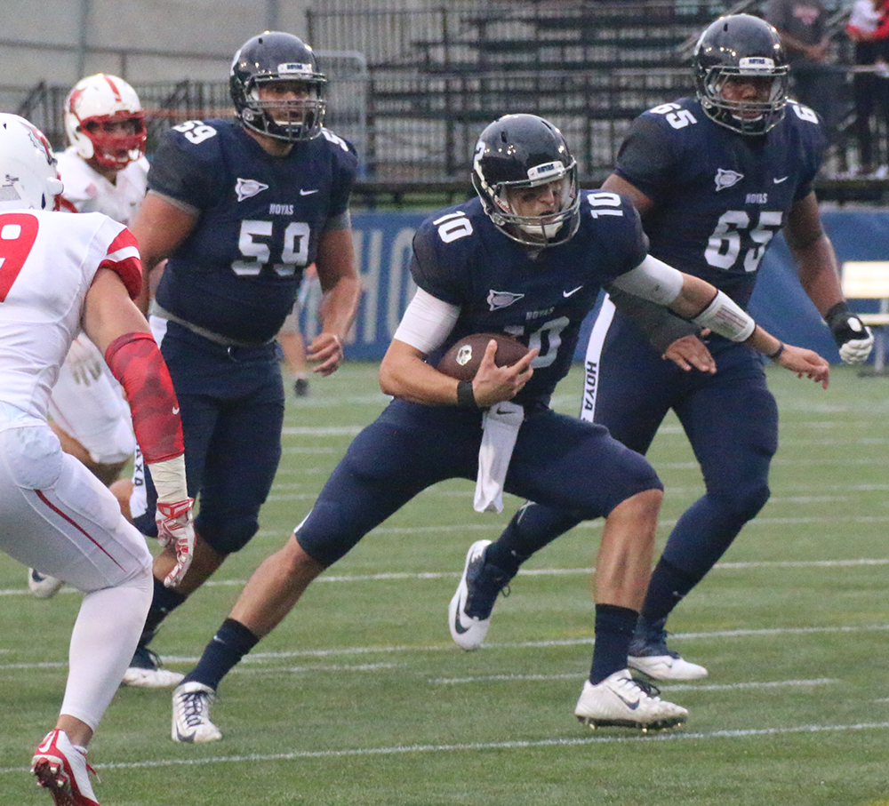 ISABEL BINAMIRA/THE HOYA
Senior quarterback Kyle Nolan was named Patriot League Offensive Player of the Week following a 200-yard performance against Marist. Nolan threw for two touchdowns and zero interceptions and also rushed for 26 yards.   