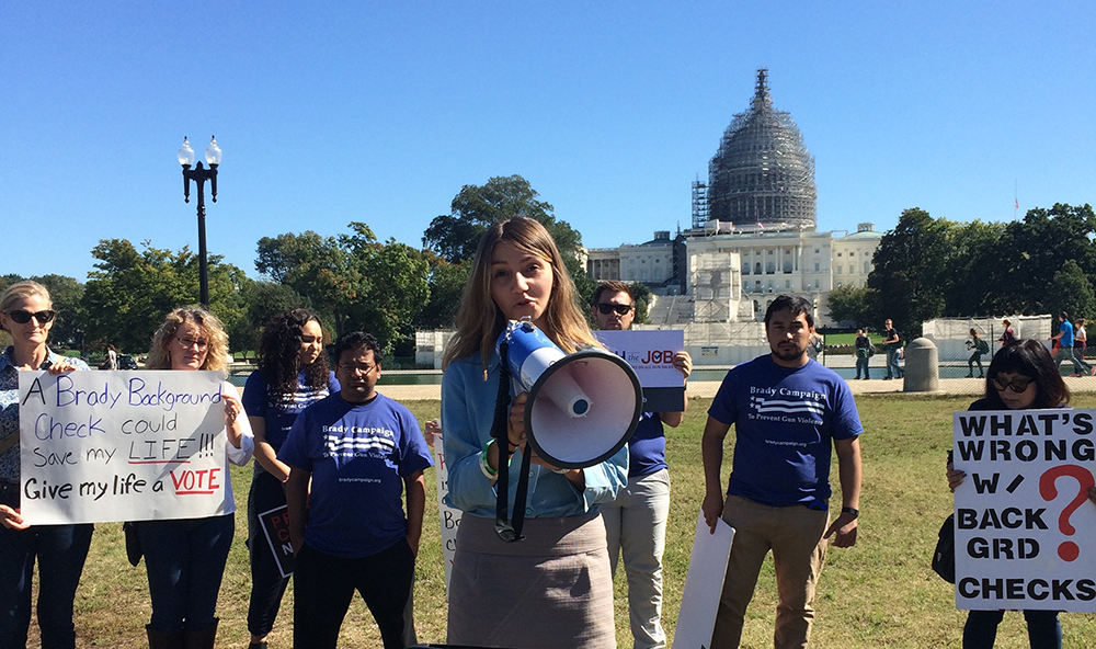 MOLLY COOKE FOR THE HOYA
Georgetown Against Gun Violence President Emma Iannini (SFS ’16), center, addresses Tuesday’s Brady Campaign to Prevent Gun Violence and Generation Progress rally.