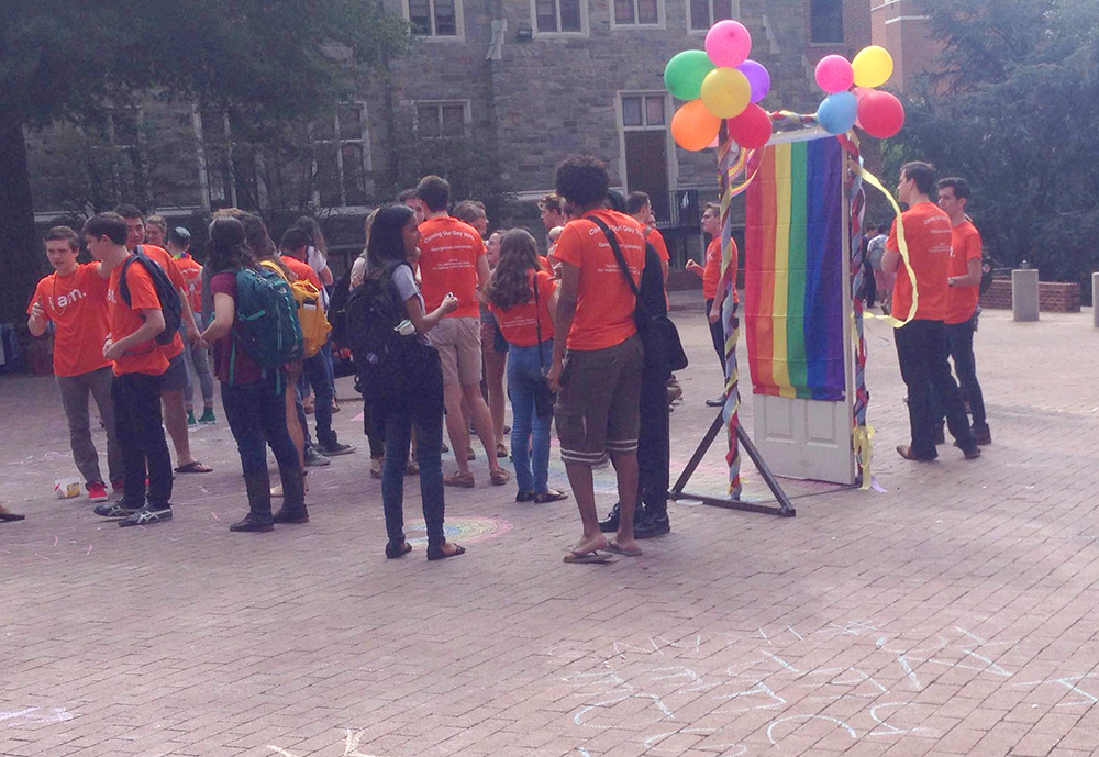 ISABEL BINAMIRA/THE HOYA
GU Pride organized a celebration of Coming Out Day in Red Square last Friday to kick off the 11th annual OUTober, which includes 15 other events organized by the LGBTQ Resource Center throughout October and the first three weeks of November.