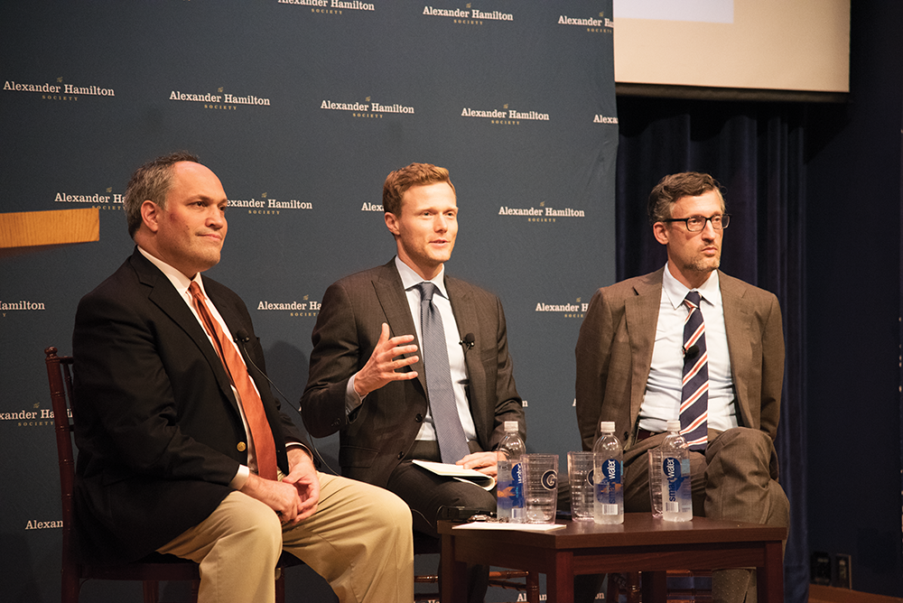ELIZA MINEAUX FOR THE HOYA
Professor Matthew Kroenig, center, moderated a discussion on nuclear nonproliferation and North Korea between former Pentagon official Michael Rubin, left, and newly appointed Vice Dean of Georgetown College David Edelstein, right, on Wednesday night.