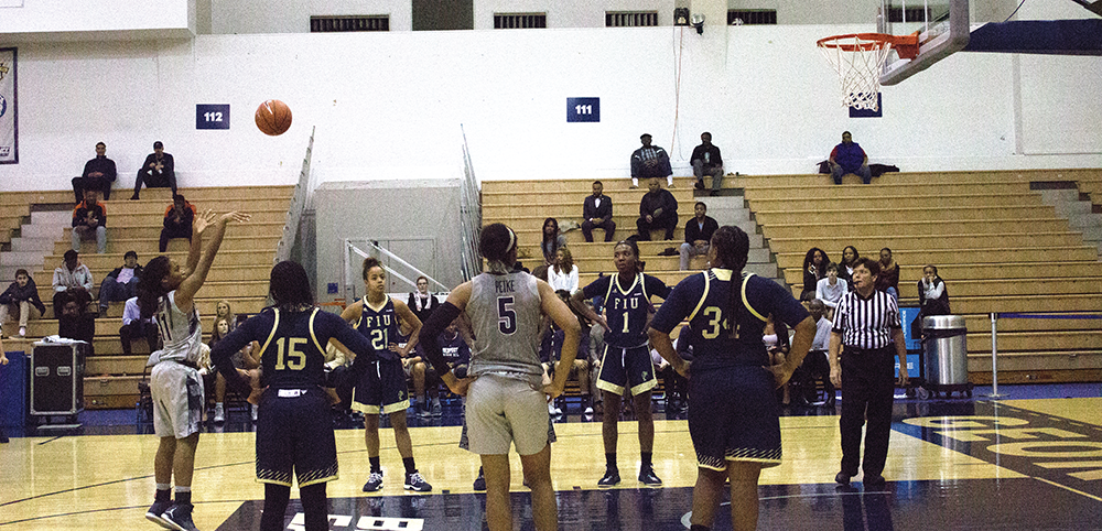 CAROLINE PAPPAS/THE HOYA
Junior guard Dionna White, left, leads the team with 17.6 points per game and ranks second with 7.0 rebounds per game. White scored her 1,000th point against FIU on Wednesday.