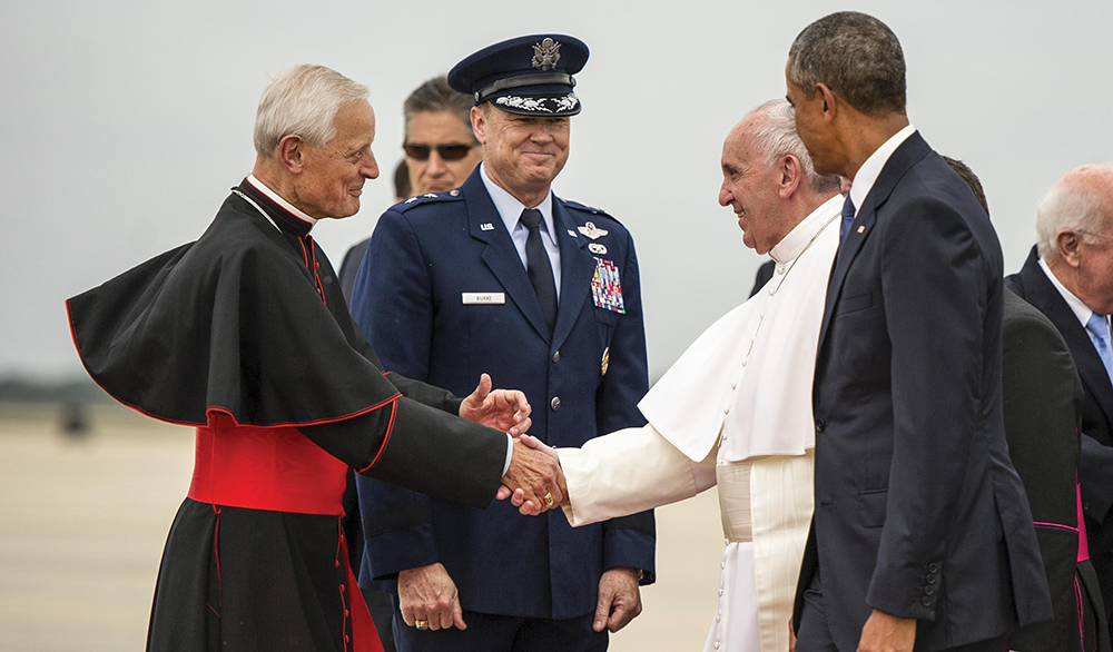 AIR FORCE
Washington-area Catholics are asking Archbishop of Washington Cardinal Donald Wuerl, left, to resign after a decade of improperly addressing widespread sexual assault within the Catholic Church. Wuerl holds an honorary degree from Georgetown, which he received in 2014.