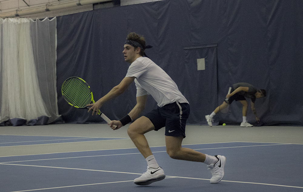 ELLIE STAAB FOR THE HOYA | Georgetown freshman Andrew Rozanow won his singles match against Longwood on Feb. 14, making his winning record 4-1 during his first season.