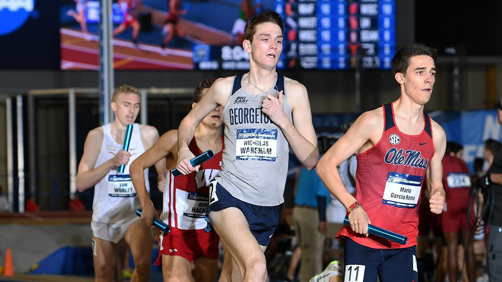 GUHOYAS| Senior Nick Wareham runs the last leg of the distance relay at the 2019 NCAA indoor track and field championships. The Hoyas finished third overall in the event.