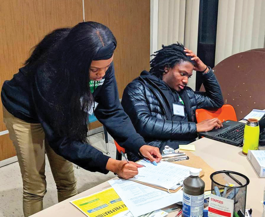 PETER NOUHAN/FACEBOOK | High school volunteers from SEED Tax Prep Ambassadors have assisted over 70 people in filing their taxes since the programs start.