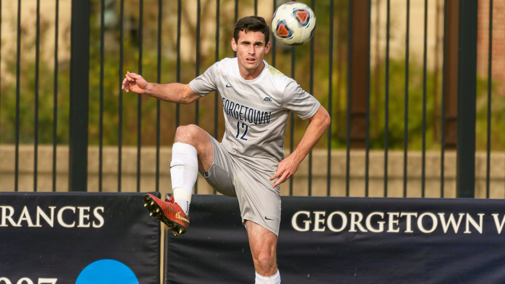 GUHOYAS | Senior defender Dylan Nealis tracks a ball down out of mid air as he plans his next move.