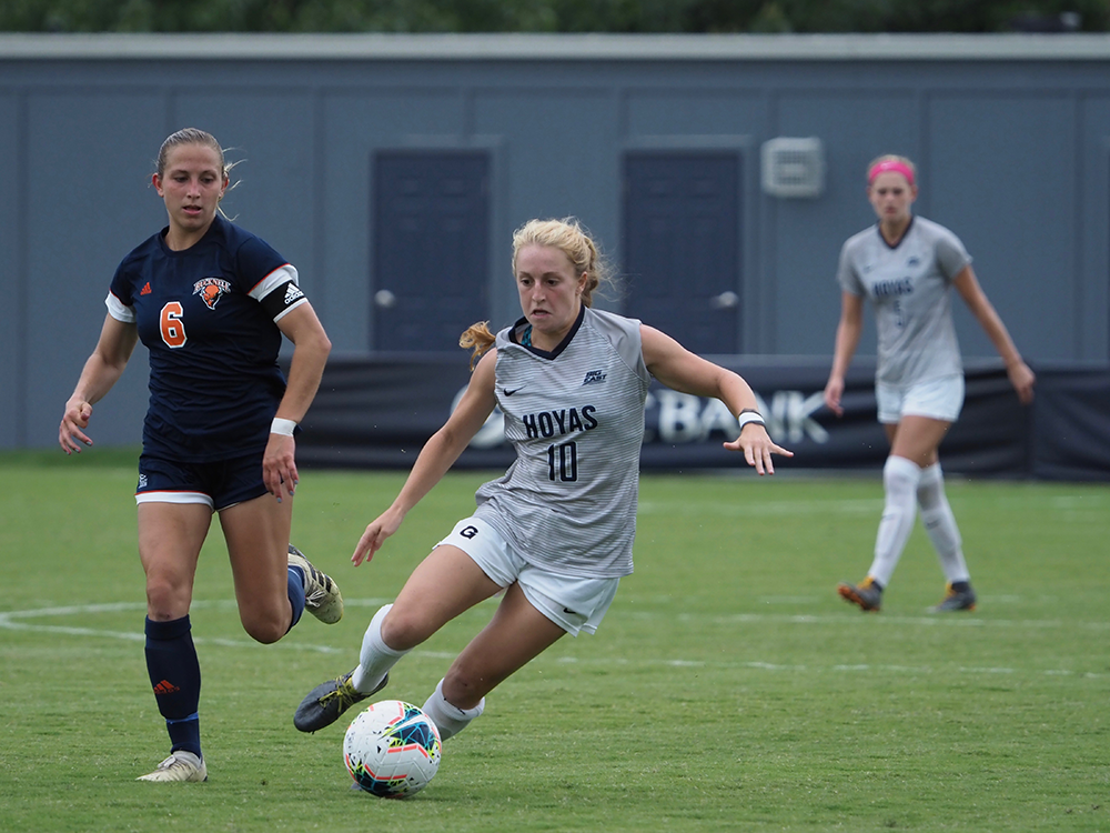 KIRK ZIESER/THE HOYA | Senior Forward Paula Germino-Watnick prepares to pass upfield against Bucknell, a game in which she also scored.