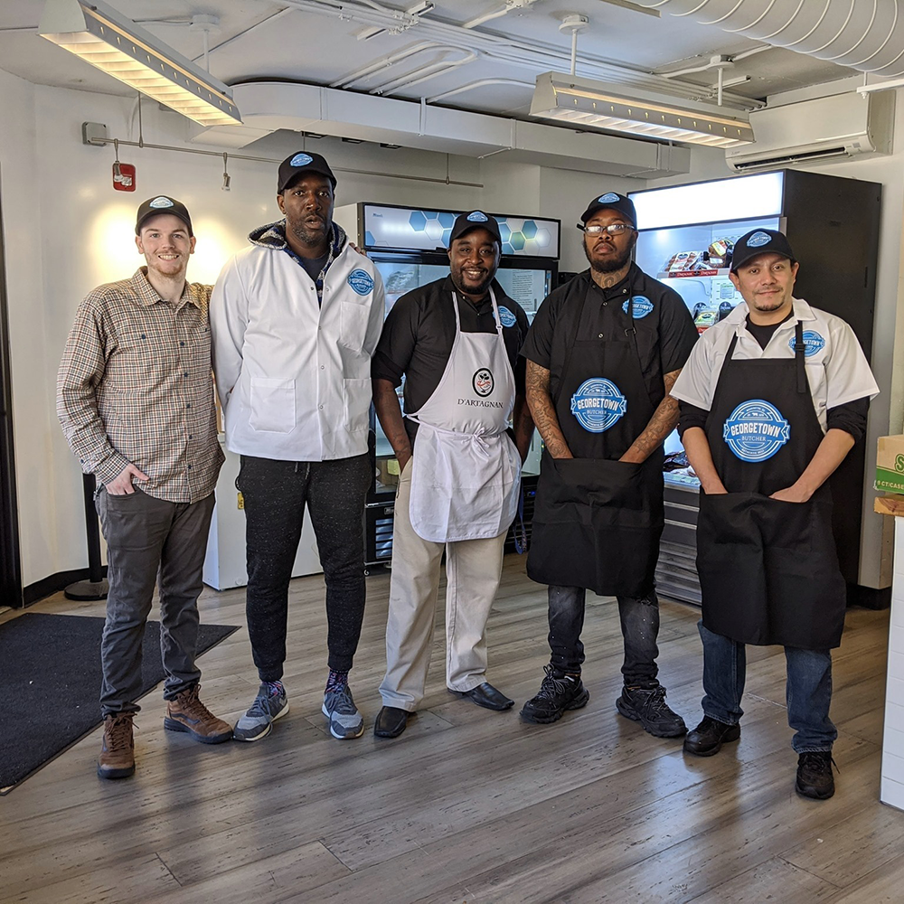 GEORGETOWNBUTCHER/FACEBOOK | Wendell Allsbrook (second from left), having worked previously at The Organic Butcher of McLean, opened Georgetown Butcher March 9 across the C&O Canal at 3210 Grace St. NW.