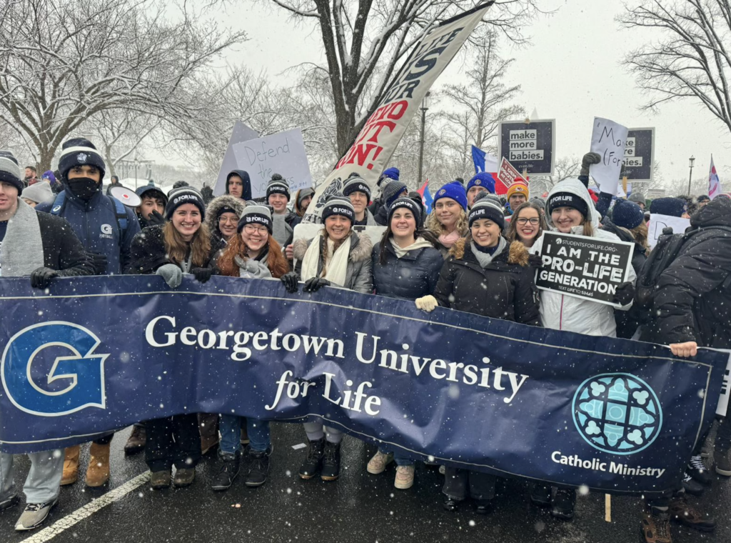 Georgetown University students and faculty joined protestors from around the country for the March For Life, which advocates for ending abortion in the U.S., Jan. 19 at the National Mall. Despite D.C.’s snowy conditions, thousands of people attended the annual march, the second since the Supreme Court  overturned Roe v. Wade. // Photo from Julian Jimenez