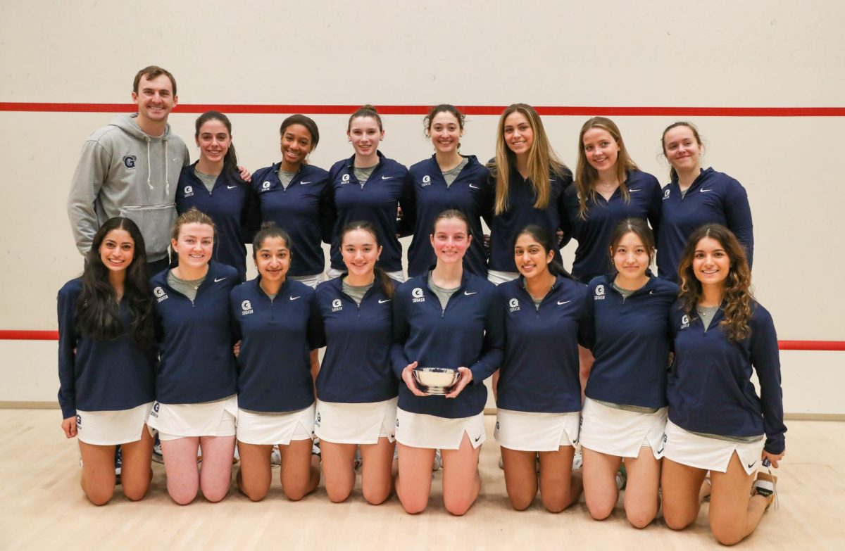 College Squash Association | Georgetown squash celebrated its first trophy in program history