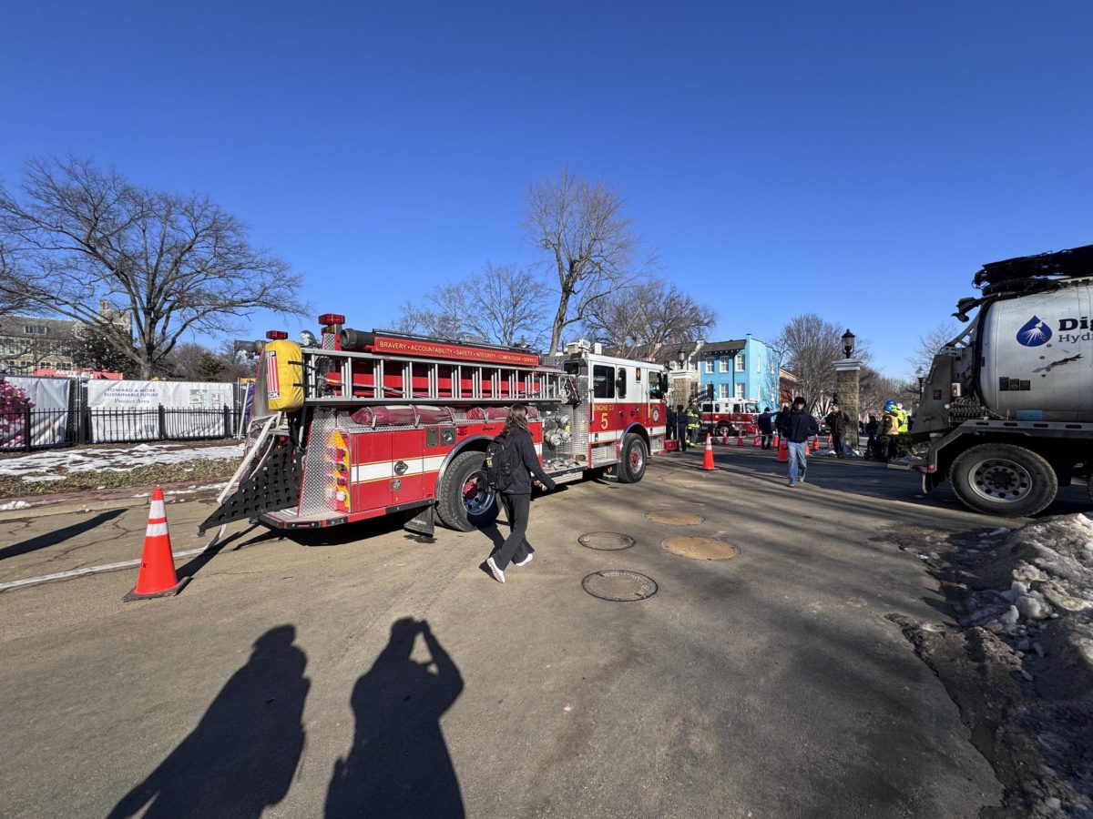 Cliff Stern/The Hoya | Flooding in the Davis Performing Arts Center (DPAC) on Jan 20. and a gas leak on Jan. 15 at Healy Circle and Copley Lawn is affecting classes and performance groups on campus. 
