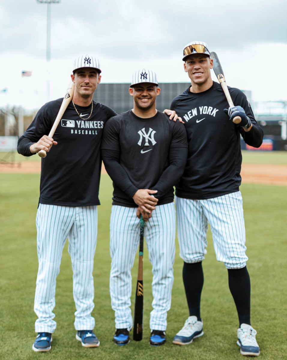 Outfielders Cody Bellinger, Jasson Dominguez and Aaron Judge pose for team photos at Yankees spring training. (@yankees/Twitter)