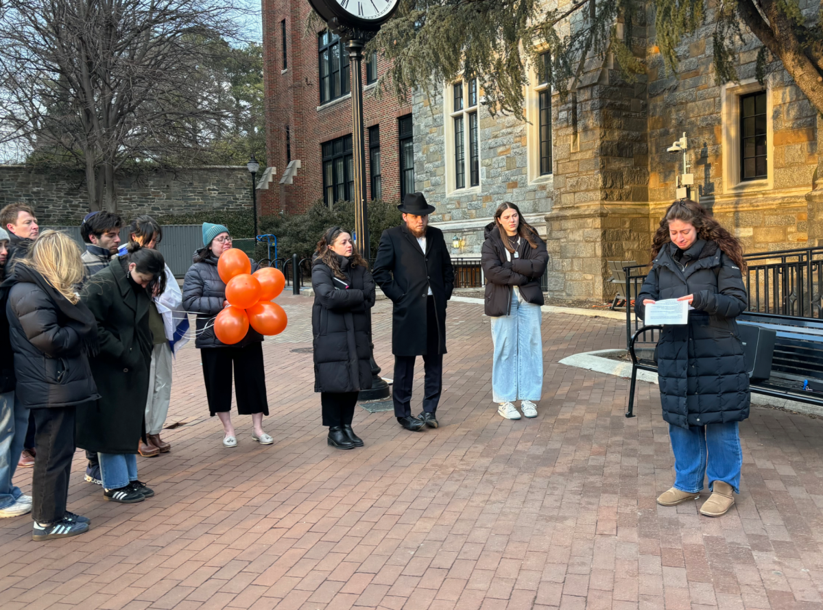 Members of Georgetown’s Office of Jewish Life, the Georgetown Israel Alliance and Chabad Georgetown held a Feb. 20 vigil to honor the Israeli hostages killed in Gaza.