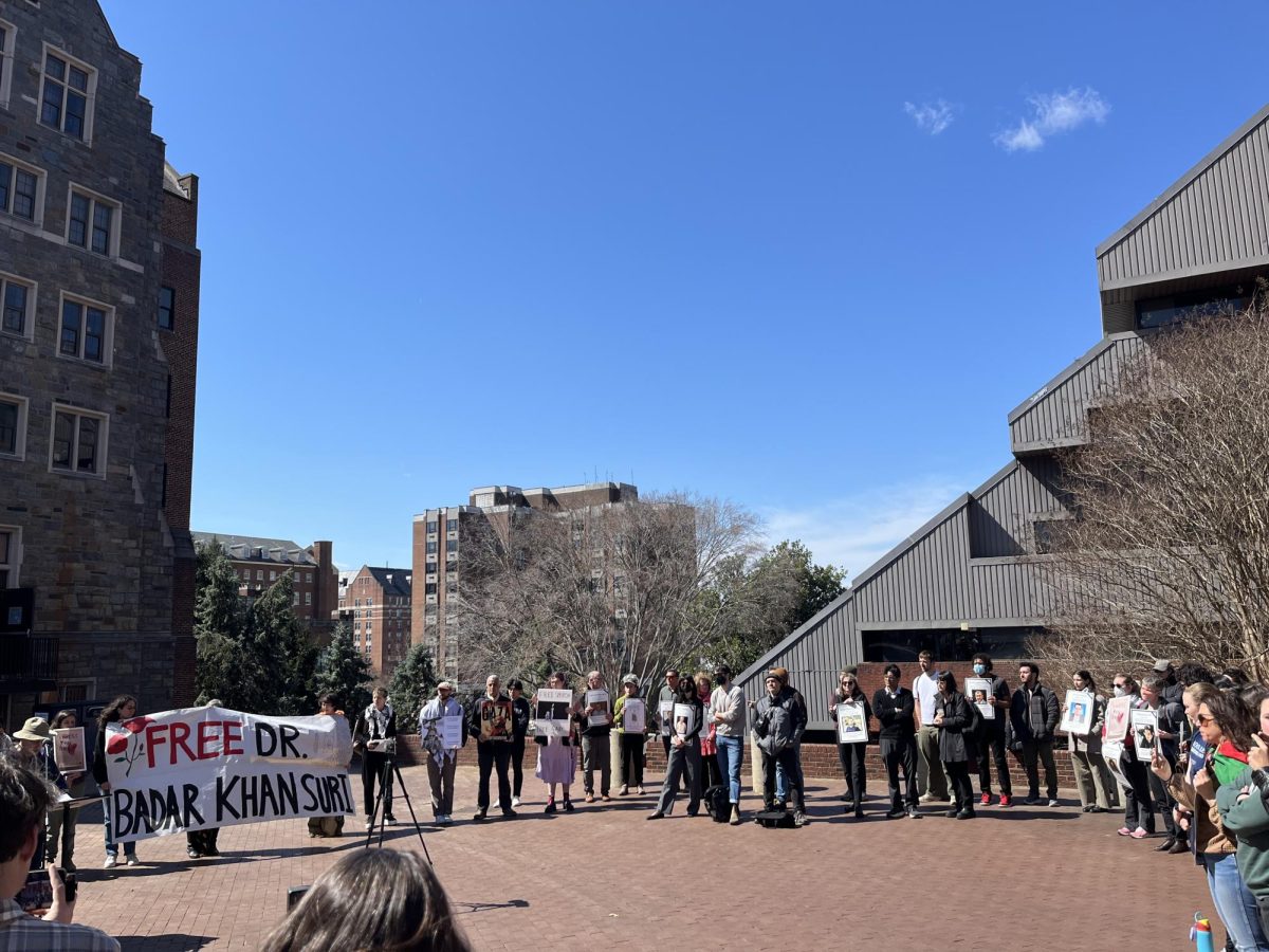 Members of the Georgetown University community defended Badar Khan Suri in a faculty-organized walkout March 25.