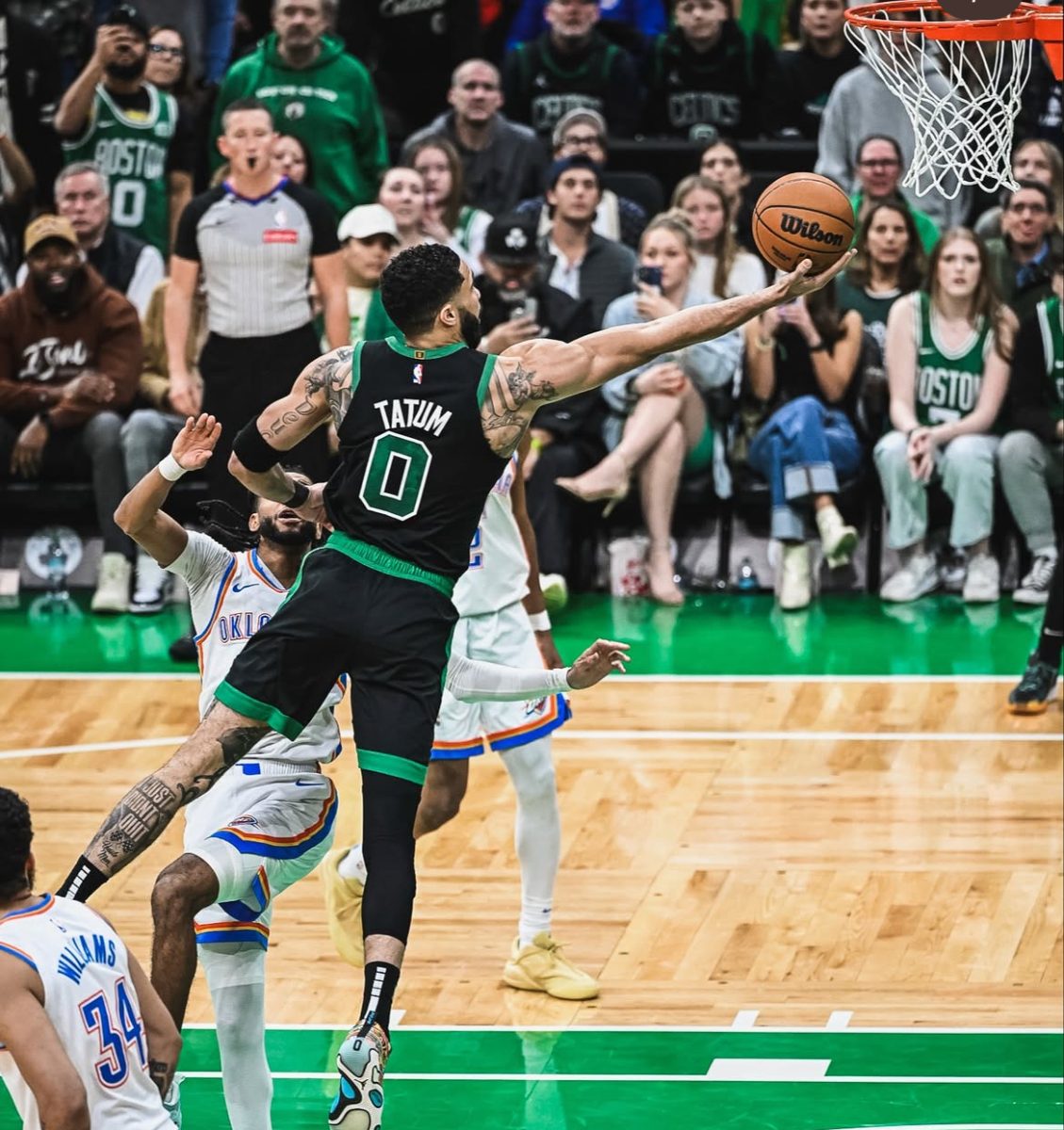 Boston Celtics player Jayson Tatum goes up for a shot during a game against the Oklahoma City Thunder. With the NBA playoffs approaching, Jay Kakani and Owen Khanna break down which teams look to be title contenders and which may not be as good as they look. (@celtics/Instagram)
