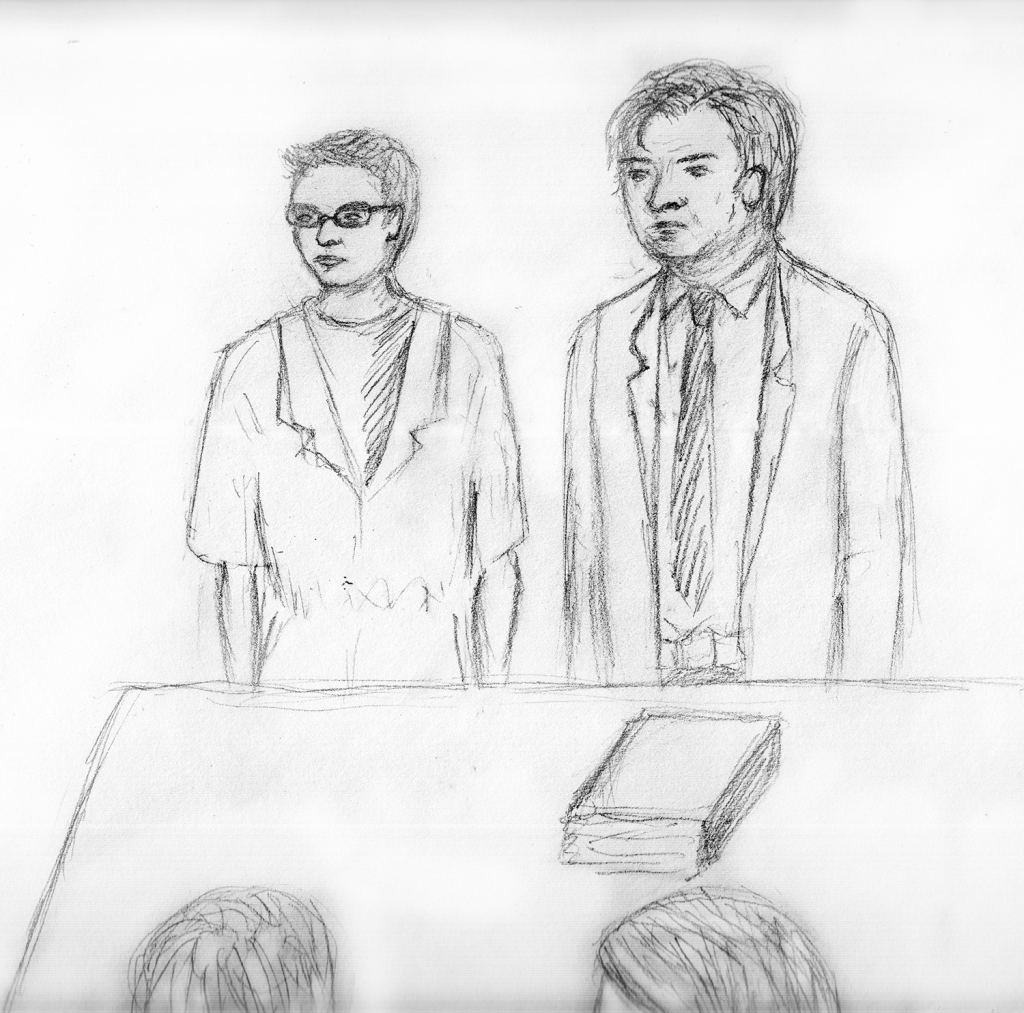 MICHELLE XU/THE HOYA Danny Milzman and his lawyer at his original detention hearing Tuesday. 