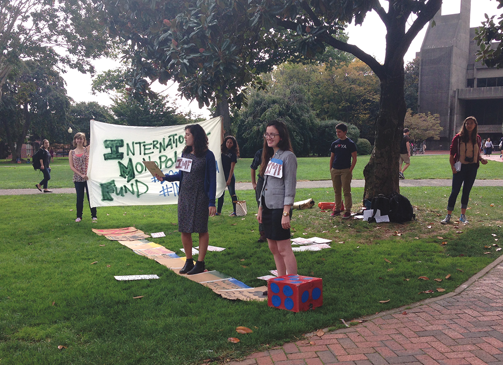 EMMA HINCHLIFFE/THE HOYA
Students protested a lecture by IMF Managing Director Christine 
Lagarde with a live-action board game in Healy Circle. 