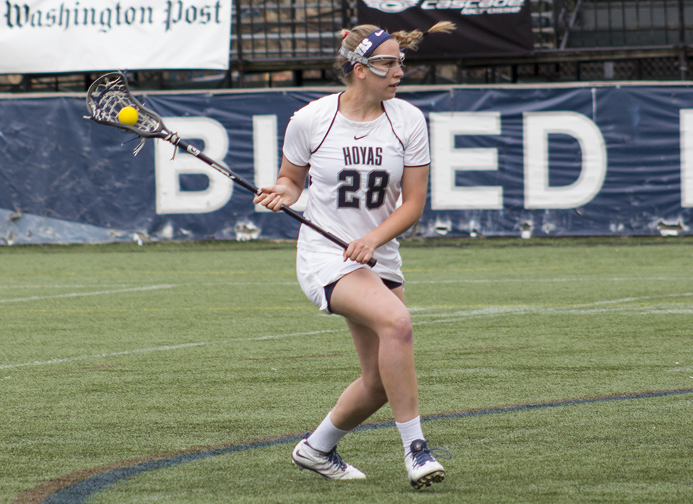 CLAIRE SOISSON/THE HOYA
Junior midfielder Kristen Bandos scored a game-high five goals in Wednesday night’s game against UConn. Her final goal came in the last 15 seconds of the match and secured Georgetown’s victory.