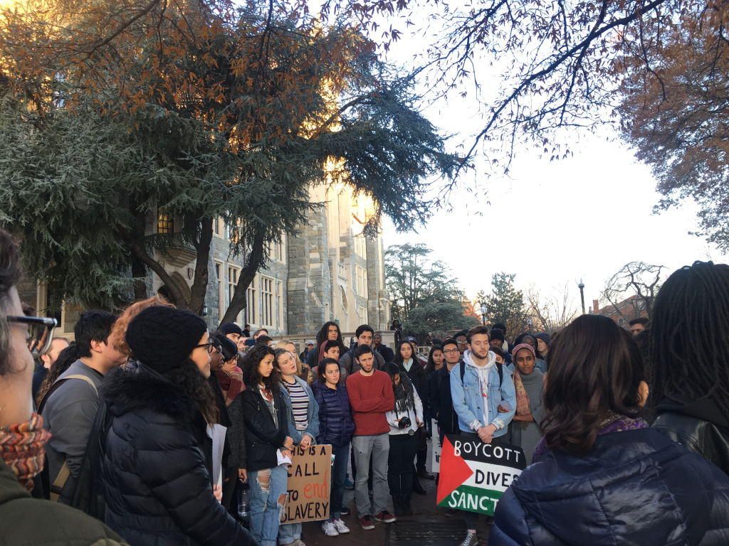 JEANINE SANTUCCI/THE HOYA
Students gathered in Red Square on Wednesday before marching to University President John J. DeGioias office to deliver a letter requesting transparency on the universitys endowment. 
