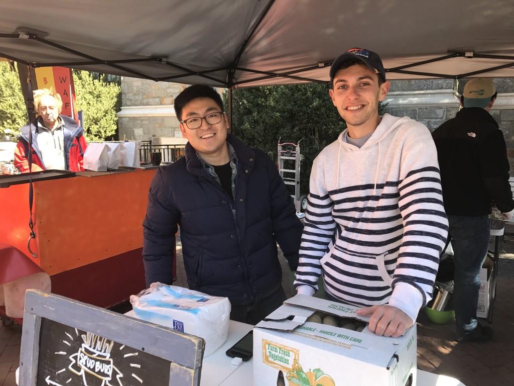WILLIAM ZHU/THE HOYA
Joseph Hwang (MSB ’19), left, and Chas Newman (MSB ’19) launched their french fries company at the year’s first farmers’ market.