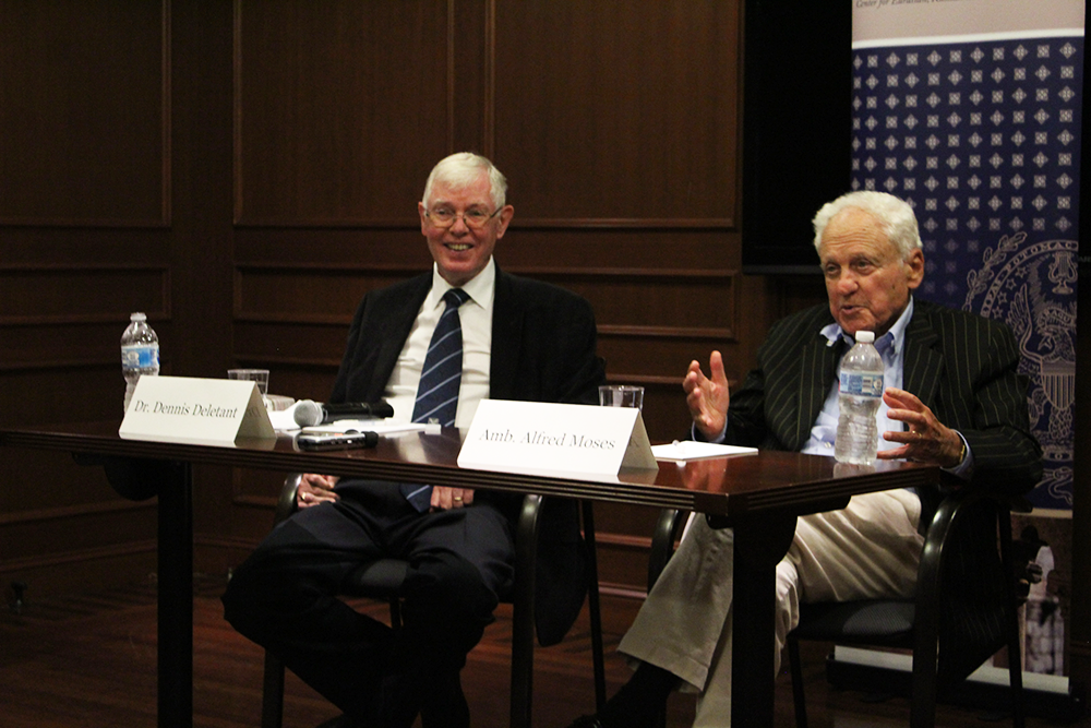 ASHLEY CHEN FOR THE HOYA Professor Dennis Deletant (left) and Alfred Moses (LAW 56) (right), former U.S. ambassador to Romania, spoke about Moses efforts to help rebuild Romania following the collapse of the Soviet Union during his time as ambassador at an event Tuesday.