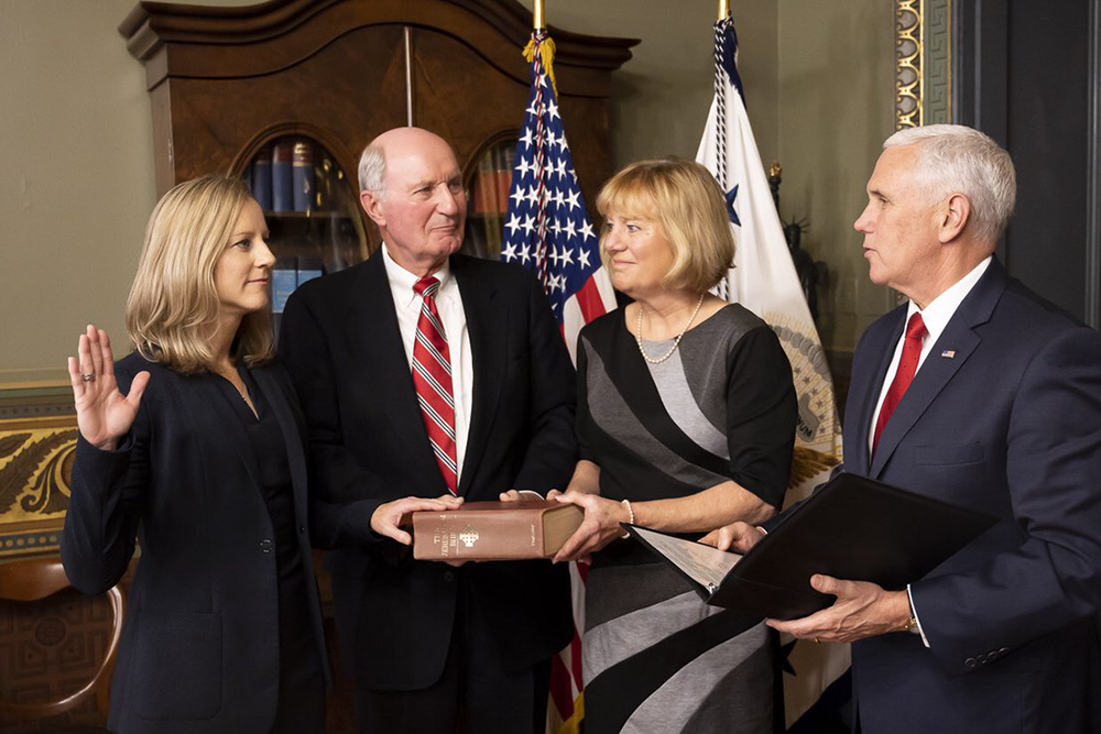 VICE PRESIDENT MIKE PENCE Kathleen Kraninger (LAW ’07) (left) was sworn in Monday as the new director of the Consumer Financial Protection Bureau.