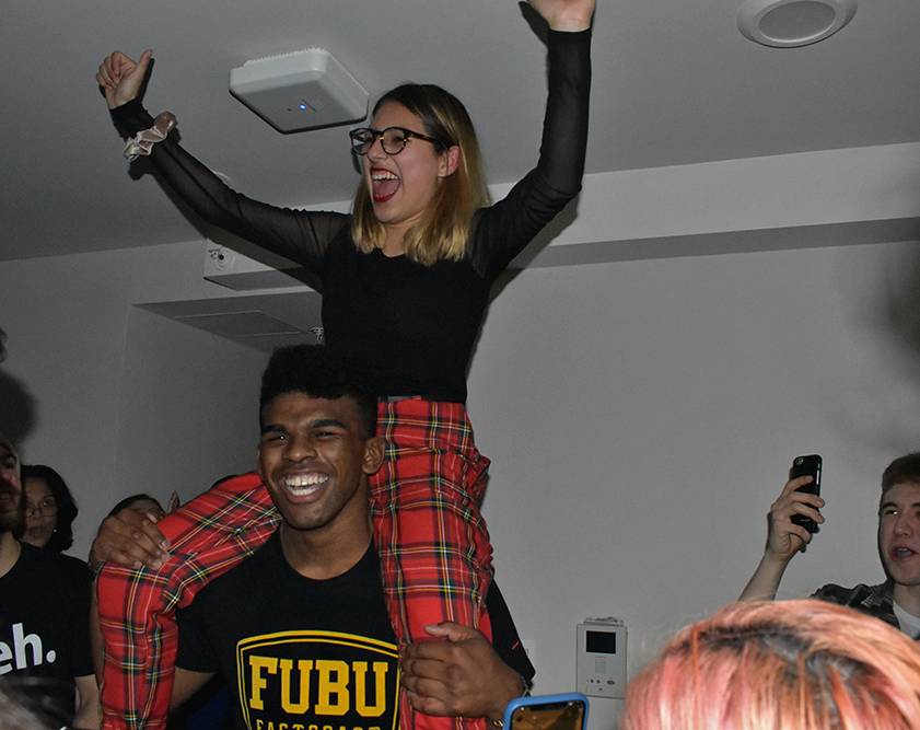 AMBER GILLETTE/THE HOYA | Norman Francis Jr. (COL '20) and Aleida Olvera (COL '20) celebrated their victory in the 2019 GUSA executive election Saturday morning.