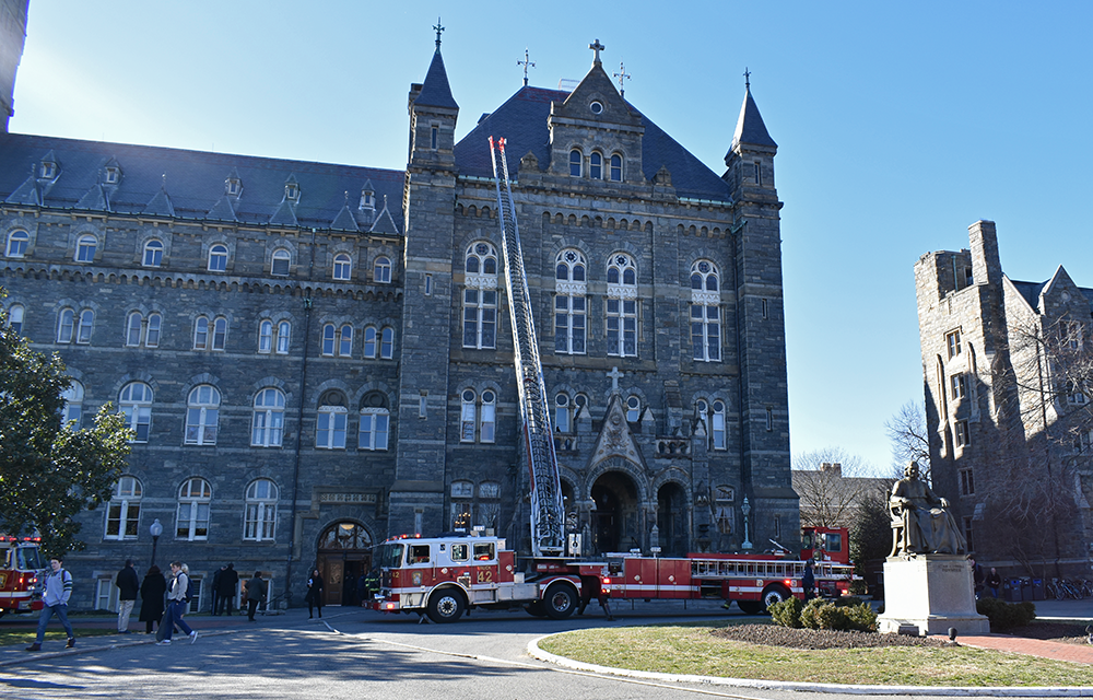 MARGARET FOUBERG FOR THE HOYA | Smoke from a defective heating, ventilation and air conditioning unit caused the evacuation of Healy Hall on Monday afternoon.