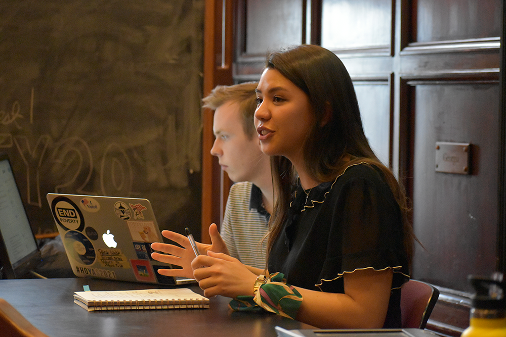 Margaret Fouberg for The Hoya | Outgoing GUSA Speaker Eliza Lafferty (COL 21) speaks at a Senate meeting this semester. The Senate was scheduled to approve the results of the referendum at a meeting Sunday before the suit was brought before the Senators.