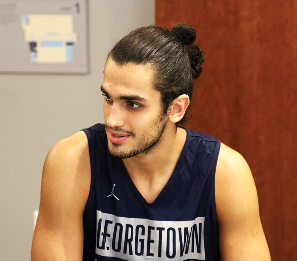 AMBER GILETTE/THE HOYA | Omer Yurtseven answers questions for student journalists in Thompson Athletic Center on Tuesday. Yurtseven is poised to lead the Hoyas frontcourt attack this season.