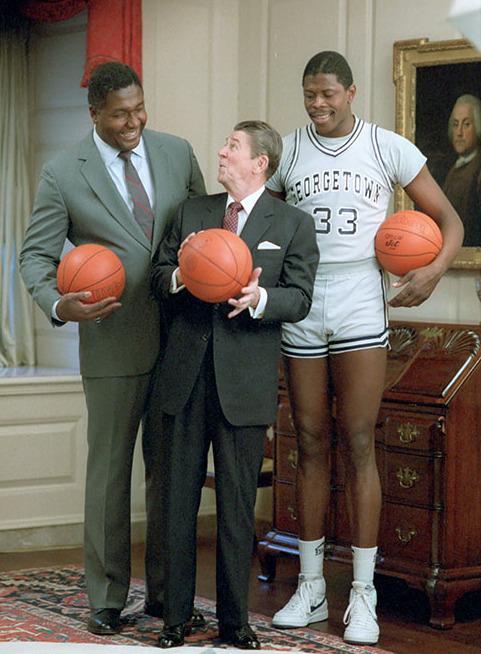 11/12/1984 President Reagan Patrick Ewing and John Thompson during a photo Op for the cover of Sports Illustrated in the Map Room