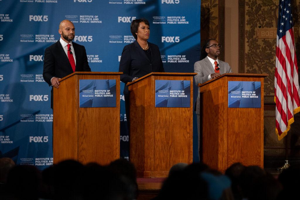 Mayoral candidates Robert White, incumbent Mayor Muriel Bowser, and Trayon White participate the DC Mayoral debate at Gaston Hall at Georgetown University on June 1st, 2022 in Washington, DC.