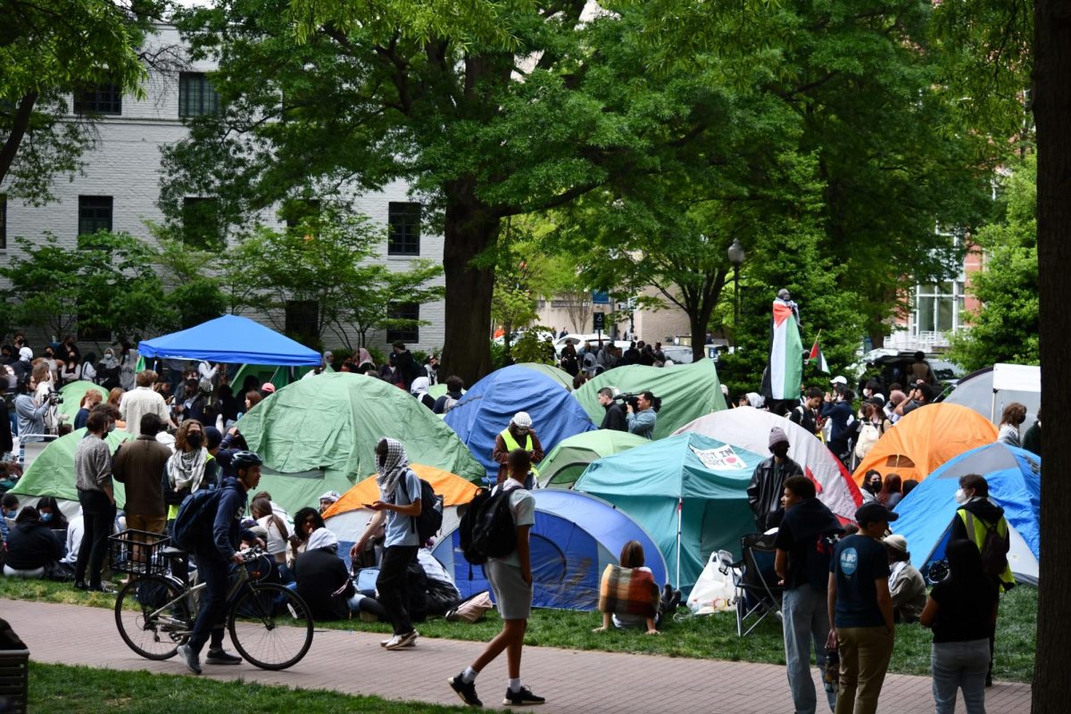 Students, faculty and staff from Georgetown University joined a tent encampment at George Washington University.