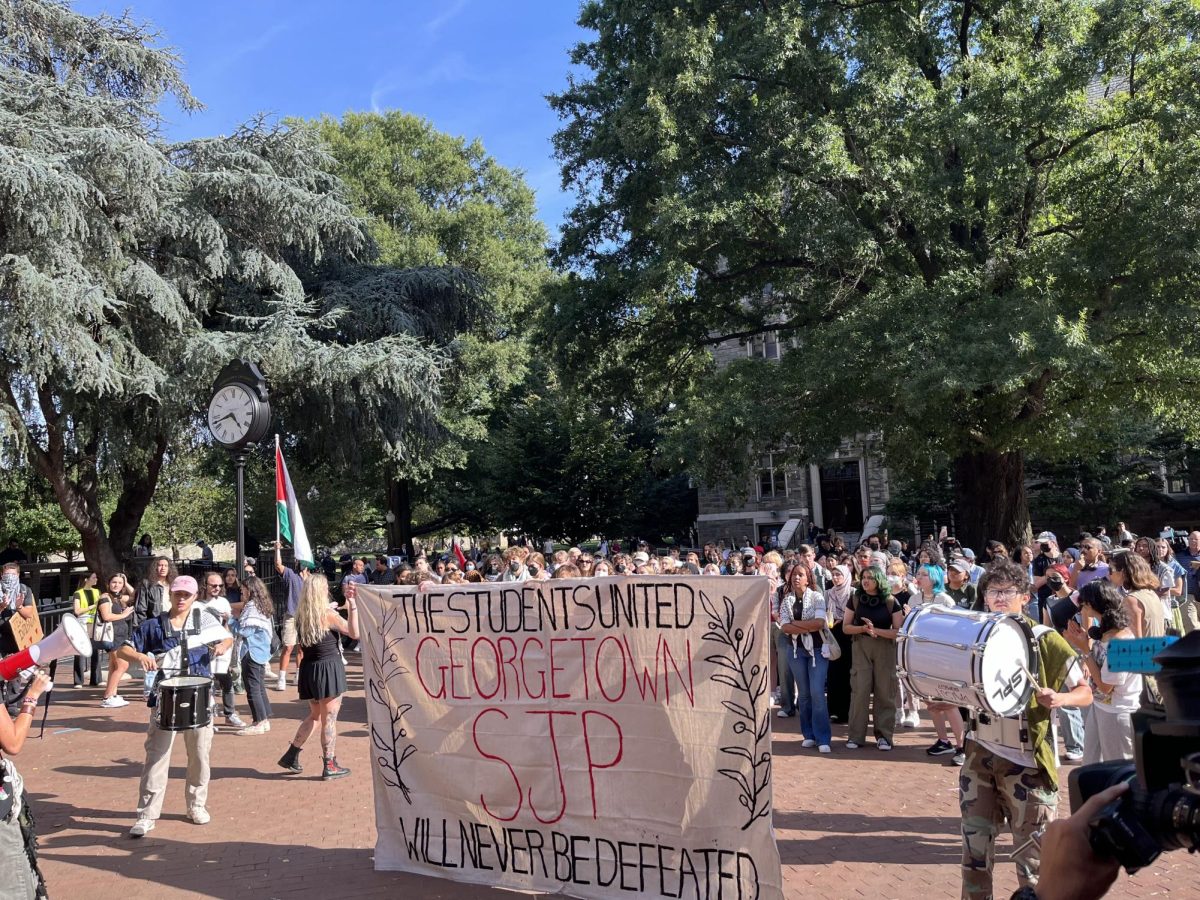 Ruth Abramovitz/The Hoya | Over 150 protesters gather in Red Square before marching across campus and regrouping in front of Leo J. O'Donovan's Hall in response to perceived university censorship of the Georgetown chapter of Students for Justice in Palestine (SJP).