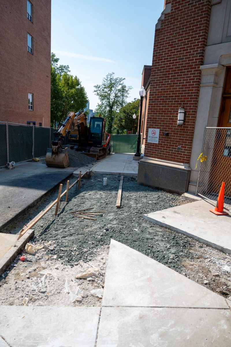 Meghan Hall/The Hoya | The Office of Planning and Facilities Management informed the Georgetown University community about a broken pipe underneath the sidewalk next to Leo J. O’Donovan Dining Hall.
