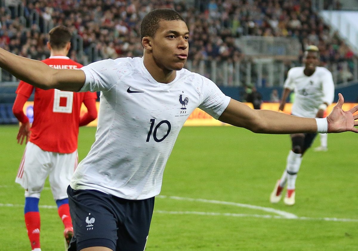 Kylian Mbappe celebrtes after scoring for the French National Team.