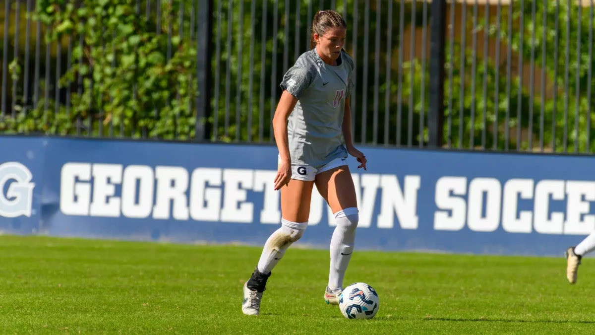 Freshman midfielder Lizzie Heller advances the ball for the Hoyas in their win on Senior Day vs. Marquette. 