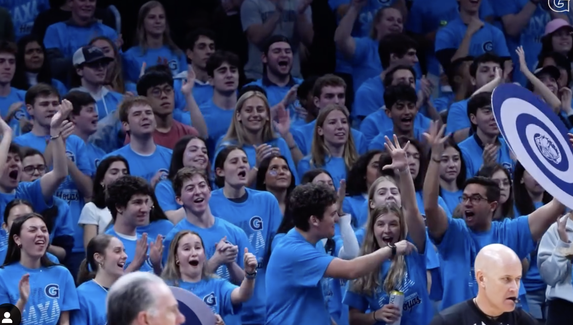 Georgetown basketball fans cheer on the team at Capital One Arena.