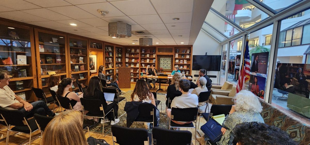 COURTESY BARBRA NAYIGA MUKUVE | Professors Joel Reynolds and Theodora Danylevich lead a talk discussing the interdisciplinary applications of disability studies Oct. 23. 