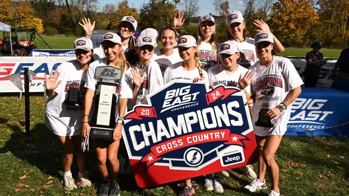 The Georgetown Women's Cross Country team celebrates their 5th straight Big East Cross Country Championship. (GUHoyas)
