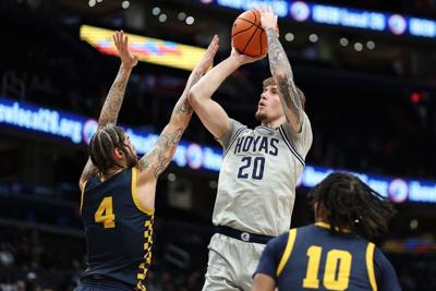 Sophomore forward Drew Fielder shoots a jump shot in Georgetown's game against the Coppin State Eagles Dec. 28. Fielder recorded a career-high 20 points and 13 rebounds, securing his first career double-double. (CBS19)