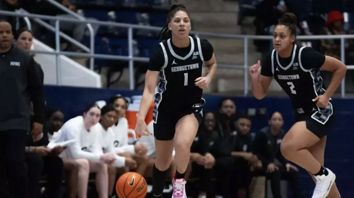Graduate guard Kelsey Ransom dribbles the ball up the court as she directs her teammates to set up a play for a score. Like previous seasons, Ransom has been a star so far in 2024-25, twice landing on the Big East weekly honor roll. (GUHoyas)