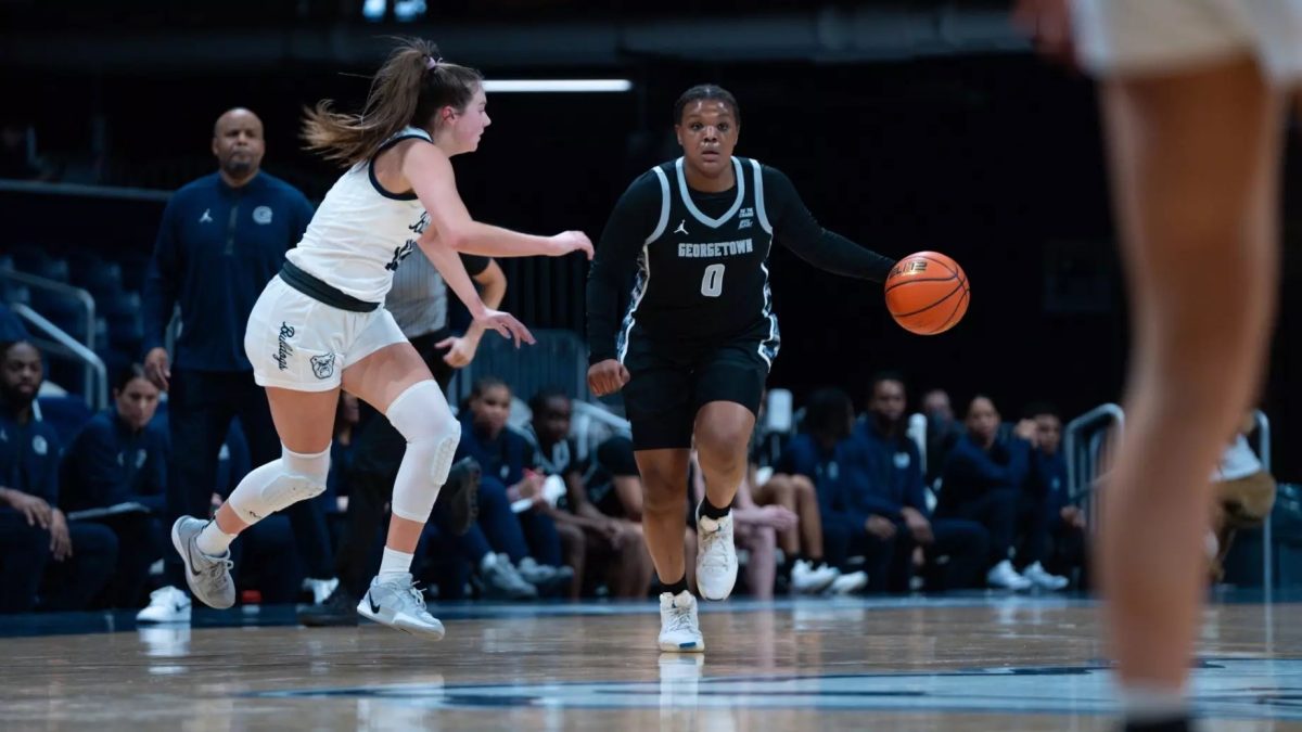 First-year guard Jaeda Wilson dribbles the ball up the court against Butler Jan. 14. The Hoyas lost to the Bulldogs 63-53.