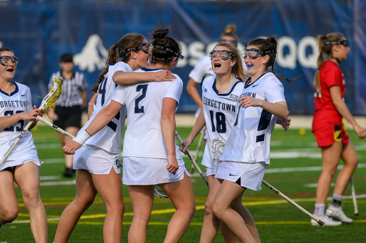 The Georgetown University women's lacrosse team celebrates after scoring a goal last season. Boasting a stellar first-year recruiting class and a well-rounded cast of returning players, the Hoyas will look to new head coach Caitlyn Phipps to bring the team to new heights this season. (@hoyaswlax/Instagram)