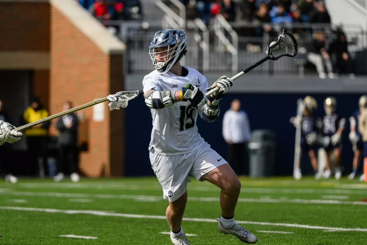 First-year attacker Jack Ransom looks to advance the ball bast the Notre Dame defense. (GUHoyas)