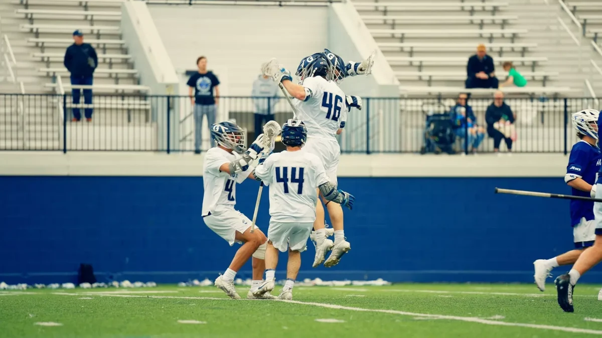 The Hoyas celebrate after scoring a goal. The Georgetown men's lacrosse team returned to action with a high scoring 17-10 beatdown of the High Point University Panthers March 15. (GU Hoyas)